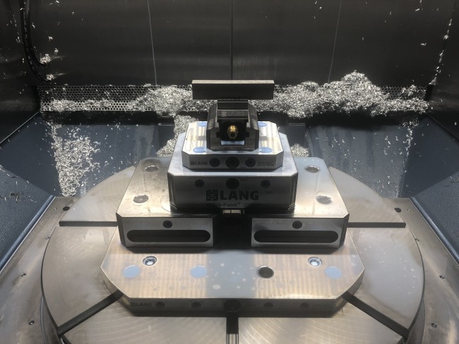 5-axis vise held securely in a zero point riser from LANG Technik