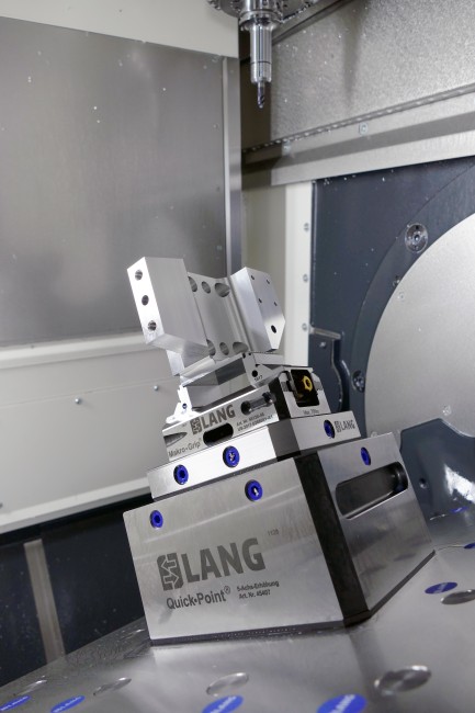 5 axis vise positioned accurately in a zero point riser from LANG Technik