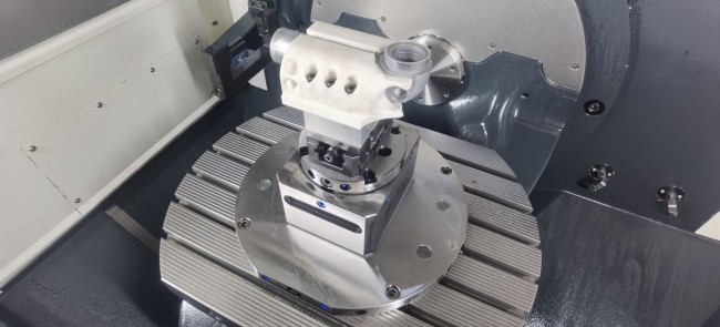 Avanti profile clamping vise clamped in a zero point riser from LANG Technik