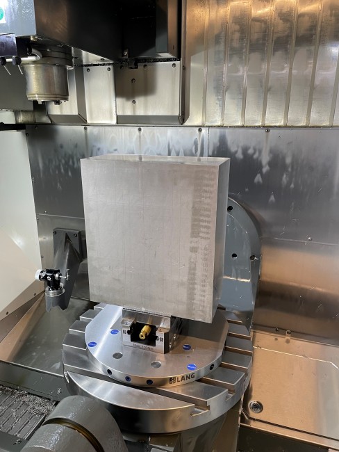 Cnc vise clamped in a zero point plate from workholding expert LANG