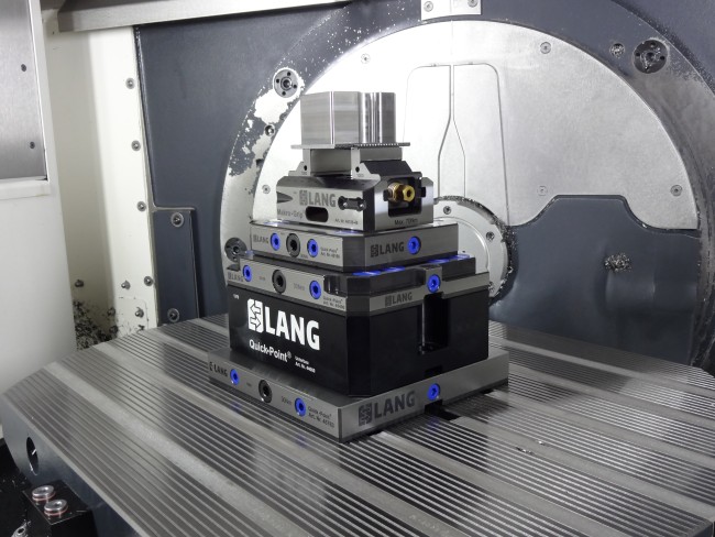 5-axis vise from LANG Technik machines raw part in a cnc machine